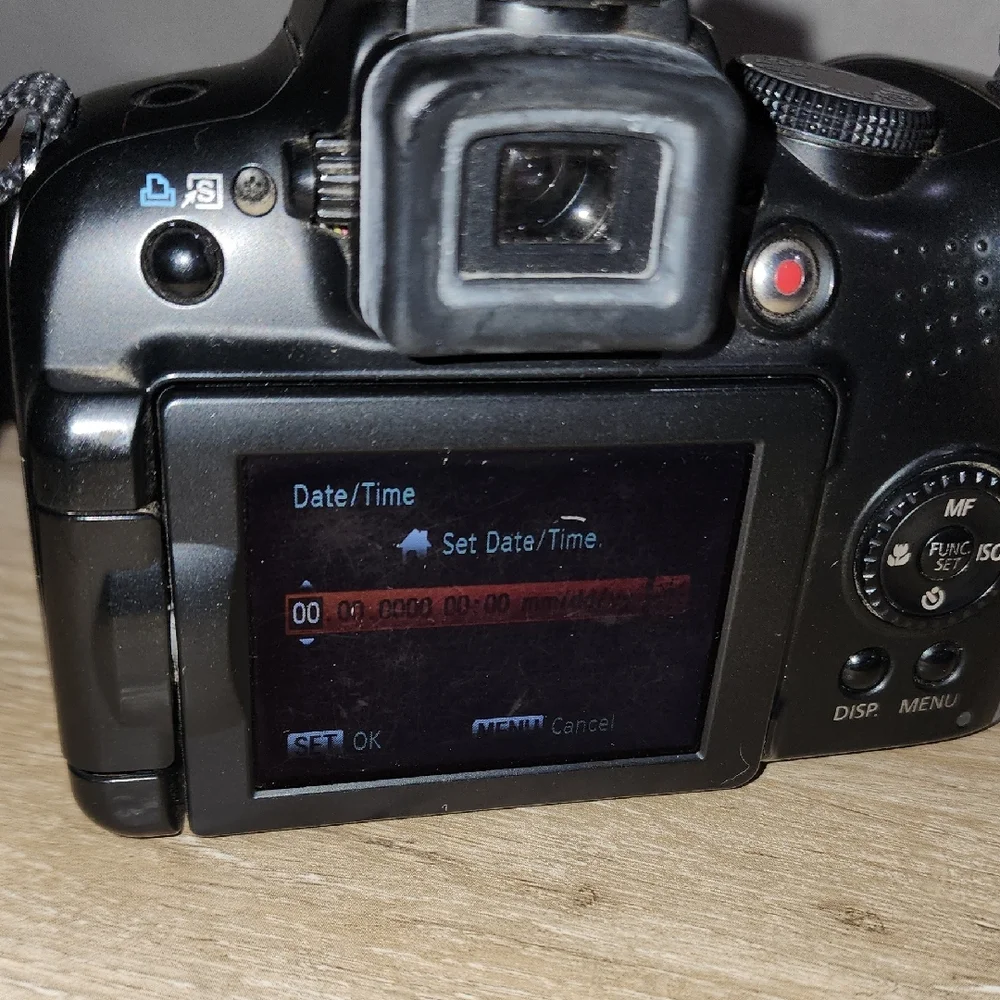 Canon Black Digital DSLR Camera with Ergonomic Grip and Optical Viewfinder
